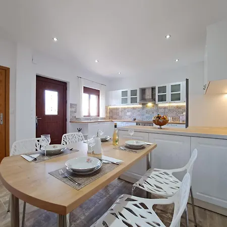 In Masari شاراكي